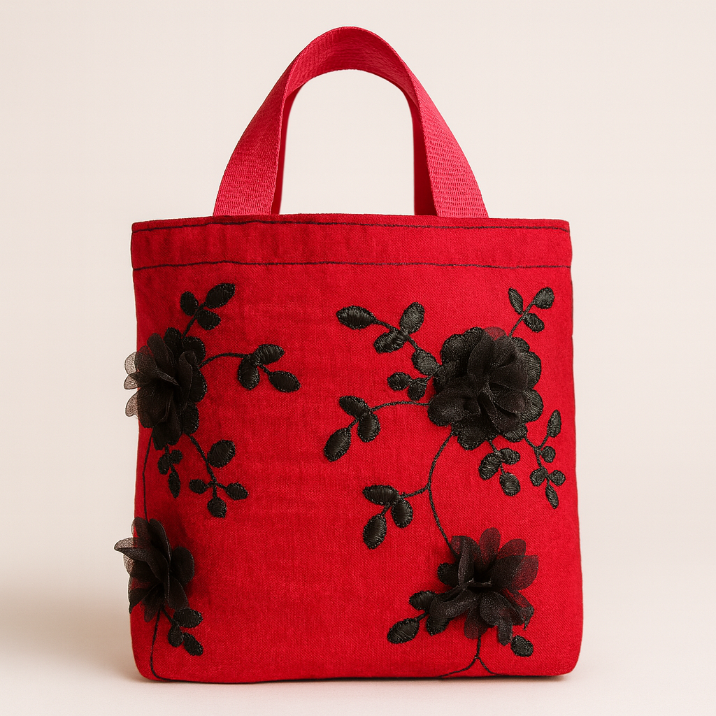 Red tote with black flowers